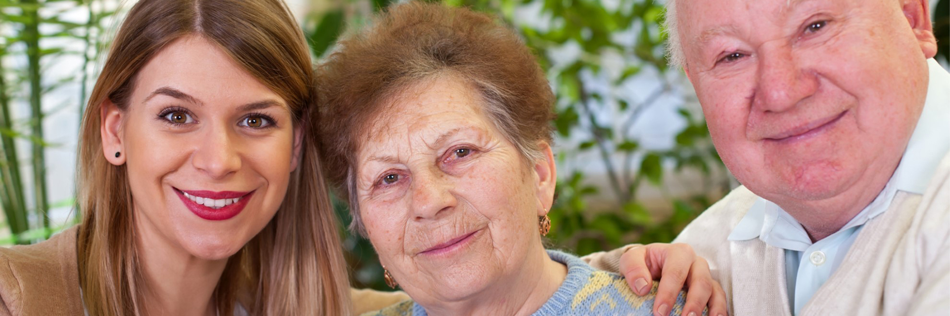 daughter with parents mom in middle with blue top
