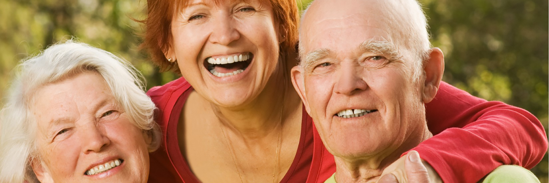 parents and daughter with red hair and red sweater